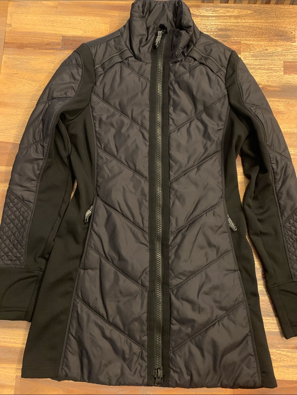 Athleta long jacket. Women’s XS. Black with reflective and quilted elements.